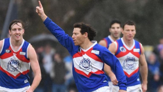 Shane Harvey celebrates a goal for North Heidelberg. Picture: Nathan William Media