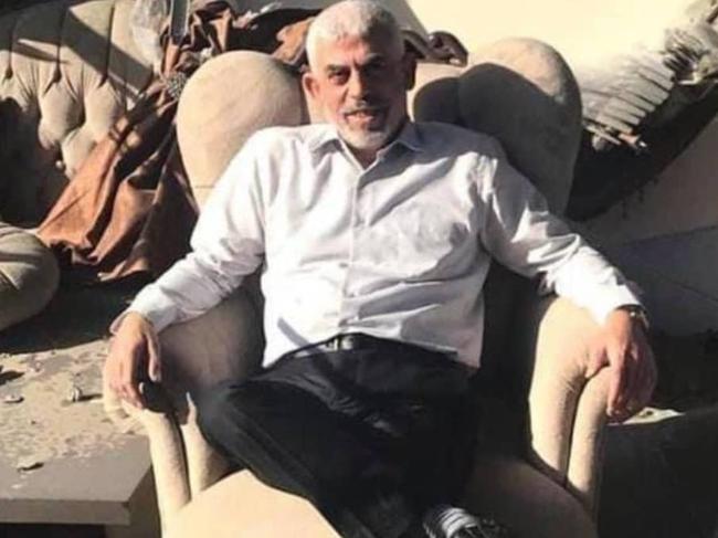 A picture of Yahya Sinwar sitting in the rubble of his home circulated on Israeli media in 2021.