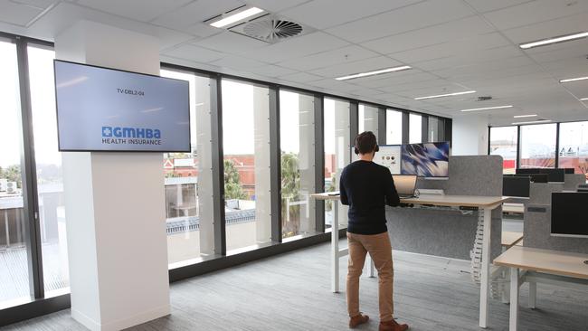 Sit-stand desks are standard throughout the office. Picture: Alan Barber