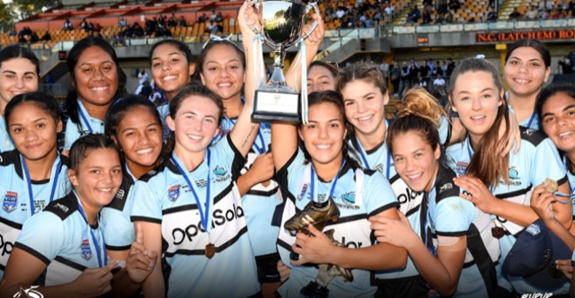 The Cronulla Sharks celebrate their Tarsha Gale Cup triumph.