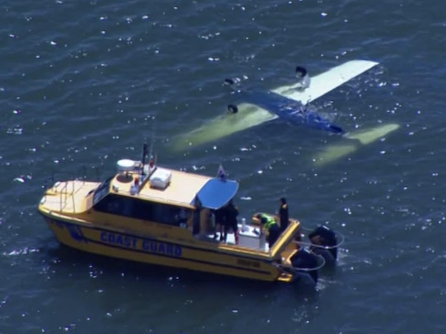 The plane remains upside down in the water. Picture: ABC