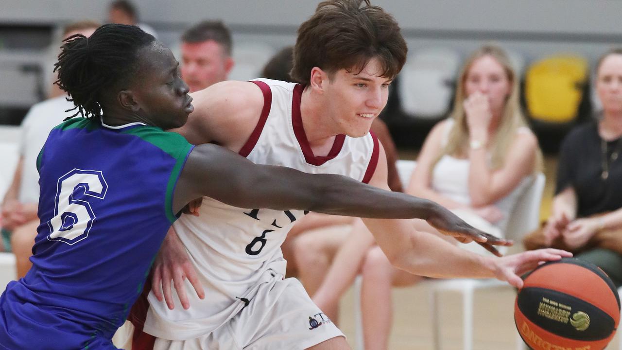 Basketball Australia Schools Championships at Carrara. Mens open final, Lake Ginninderra College Lakers V TSS (in white). the Lakers defence gave Benjamin Tweedy from TSS special attention in the final. Picture Glenn Hampson