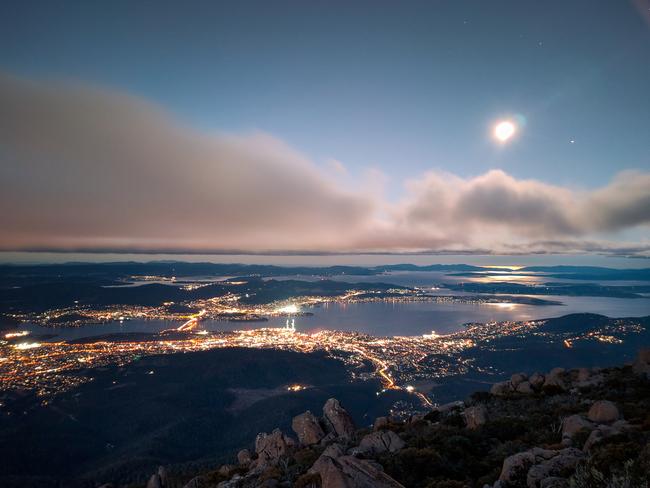 Hobart’s lights from Mt Wellington. Picture: JARRAD SENG