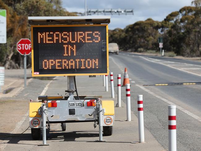 Warning signs at the South Australia/Victorian border check point at Pinnaroo. Picture: Tait Schmaal.