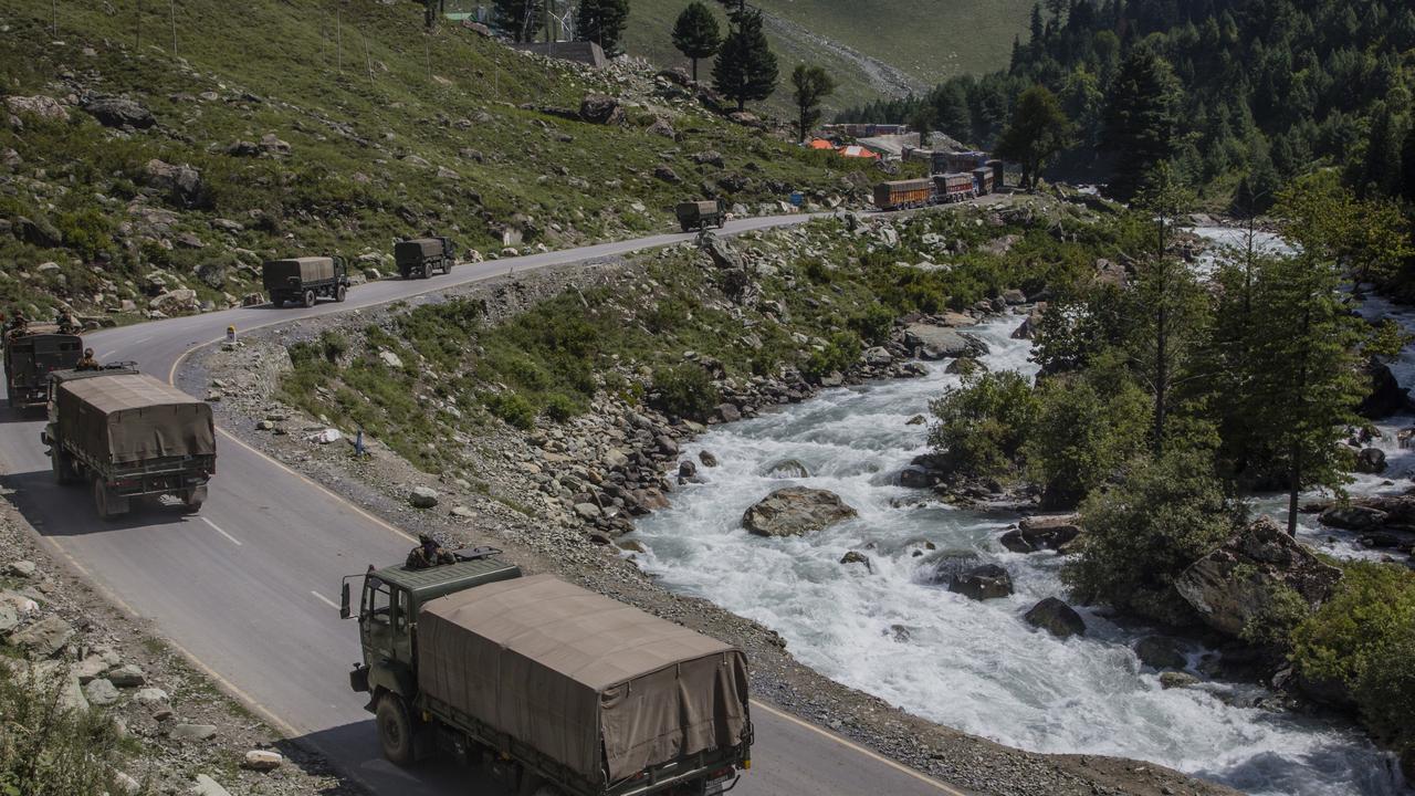 An Indian army convoy heading into the Himalayas to protest the border with China. (Photo by Yawar Nazir/Getty Images)