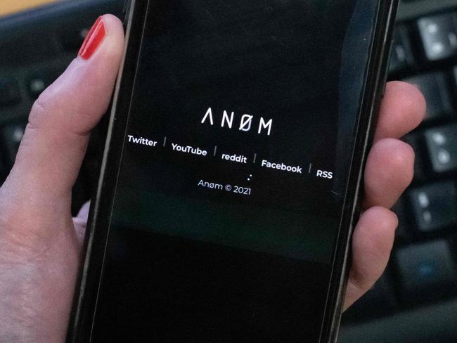 (FILES) An illustration picture shows the ANoM logo displayed on the screen of an smartphone on June 8, 2021 in Paris. The US offered a $5 million reward on June 7, 2023, for the Swedish man who marketed an encrypted communications network for drug traffickers -- unaware that the technology was developed by the FBI. The State Department posted the hefty reward for Maximilian Rivkin, who has escaped arrest since the 2021 takedown of the ANOM network. (Photo by Olivier MORIN / AFP)