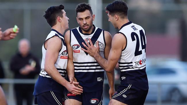 Bundoora players celebrate a goal. Picture: Steve Tanner