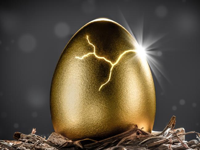 Shiny Golden Nest Egg Cracking Open With Burst Of Light - Investment Maturity Concept, superannuation super generic