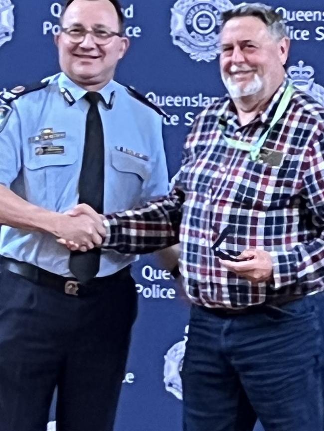 Assistant Commissioner Brian Connors with Senior Constable Adrian Edge.