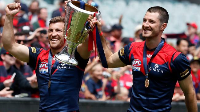 Viney and Alex Neal-Bullen take the premiership cup for gallop. Picture: AFL Photos via Getty Images