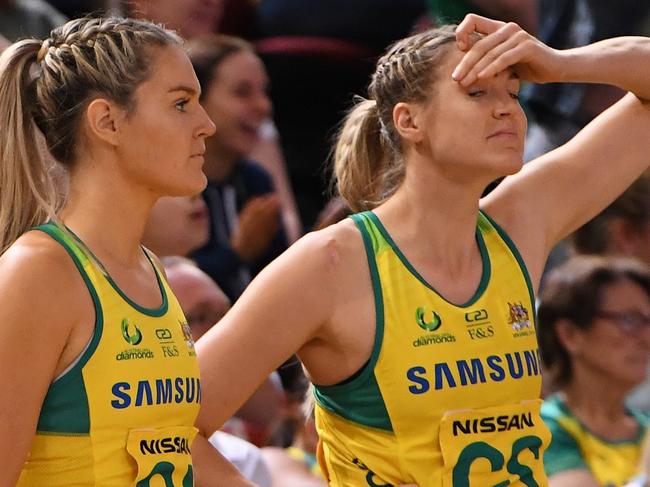 A dejected (lt-rt) Ash Brazill, Gretel Tippett and Caitlin Bassett of Australia after their loss to New Zealand during the Constellation Cup International Test match between the Australia Diamonds and the New Zealand Silver Ferns at  Qudos Bank Arena in Sydney, Sunday, October 20, 2019. (AAP Image/Dean Lewins) NO ARCHIVING, EDITORIAL USE ONLY