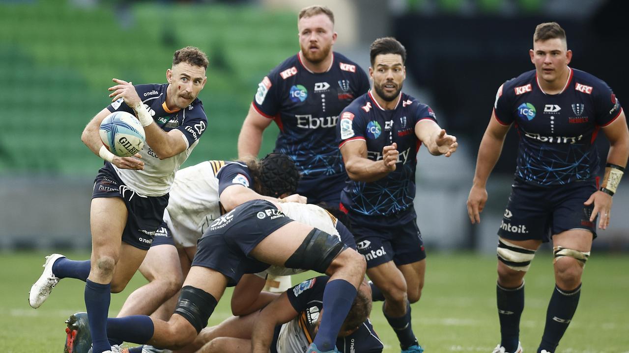 Nic White of the Brumbies passes the ball during the round 11 Super Rugby Pacific match between Melbourne Rebels and ACT Brumbies at AAMI Park, on May 07, 2023, in Melbourne, Australia. (Photo by Daniel Pockett/Getty Images)