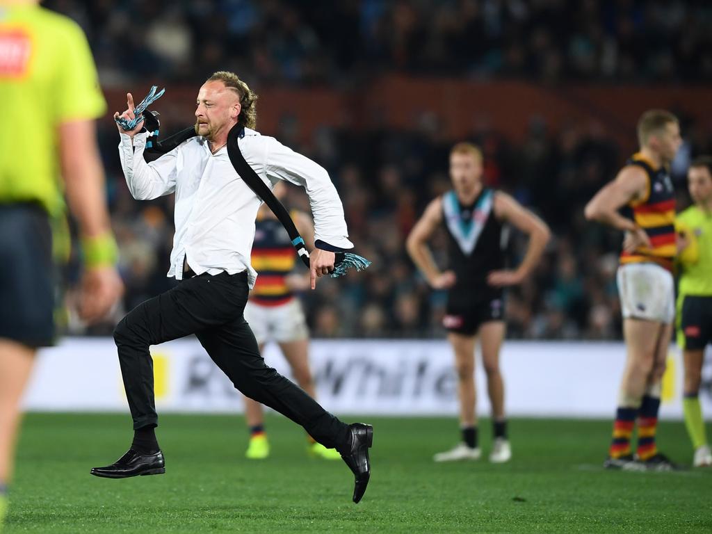 Jeremy Cortvriend runs onto Adelaide Oval. Picture: Mark Brake/Getty Images