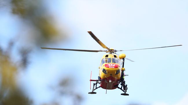 Rescue chopper searching above bushland near the East Derwent Highway Risdon Vale. Search for Risdon Prison escapee Graham John Enniss. Picture: NIKKI DAVIS-JONES