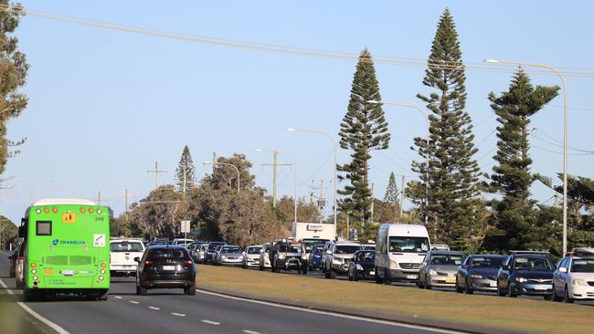 Traffic was backed from the Tugun Traffic lights back to the Gold Coast Airport thanks to border checkpoints into Queensland. Picture: Scott Powick Newscorp