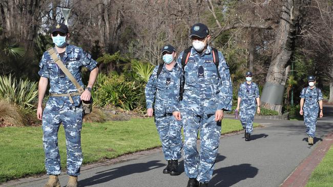 ADF personnel are seen in Fitzroy Gardens in Melbourne during stage four lockdown. Picture: David Crosling