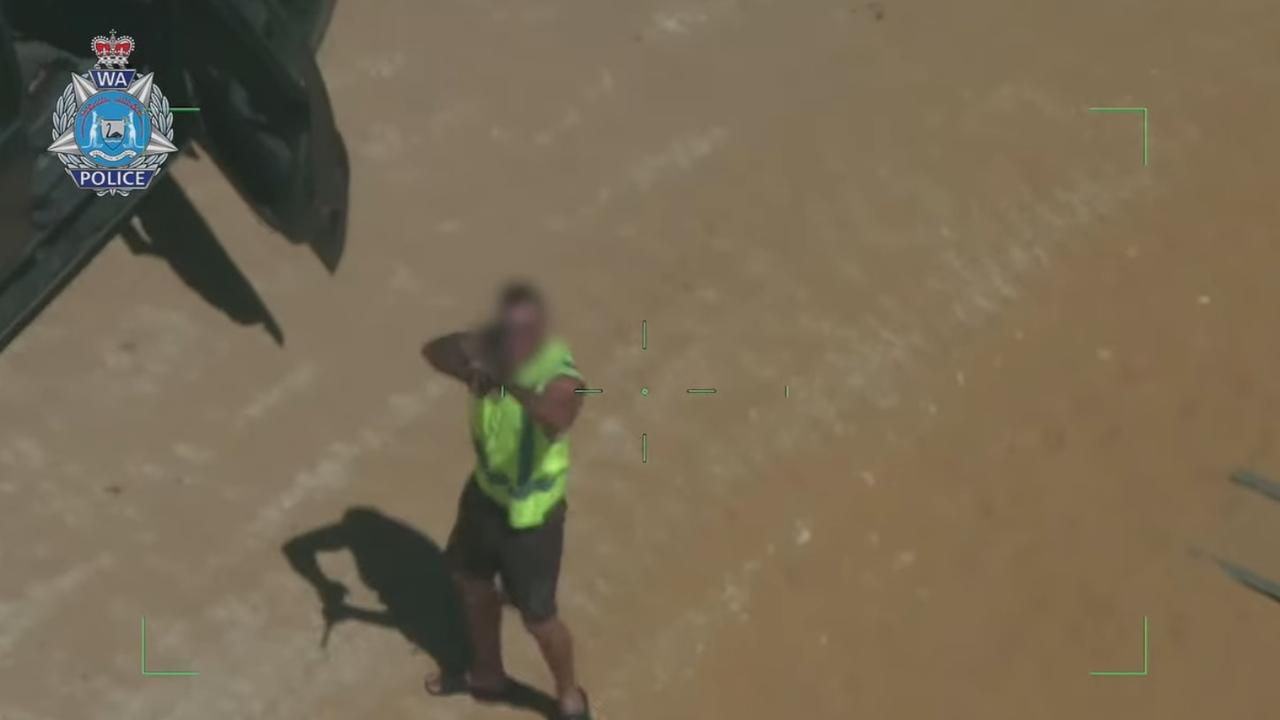 A man has been captured on video allegedly aiming a long gun at a police helicopter. Picture: WA Police