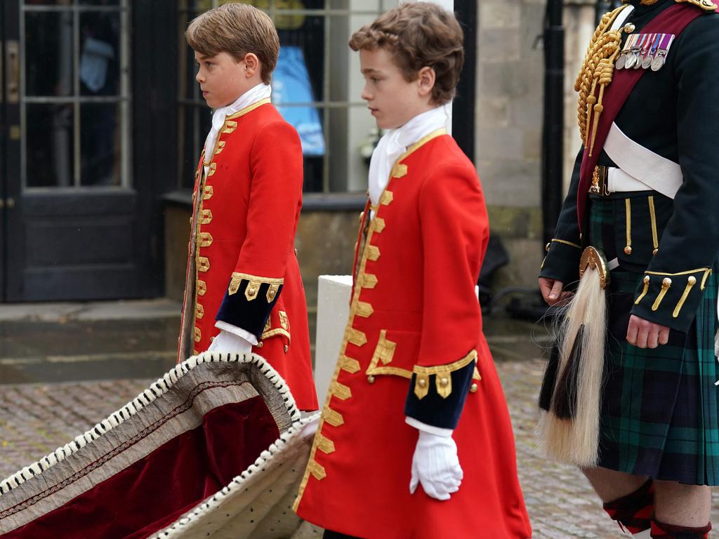 Prince George, left, will himself one day be crowned king. Picture: AFP