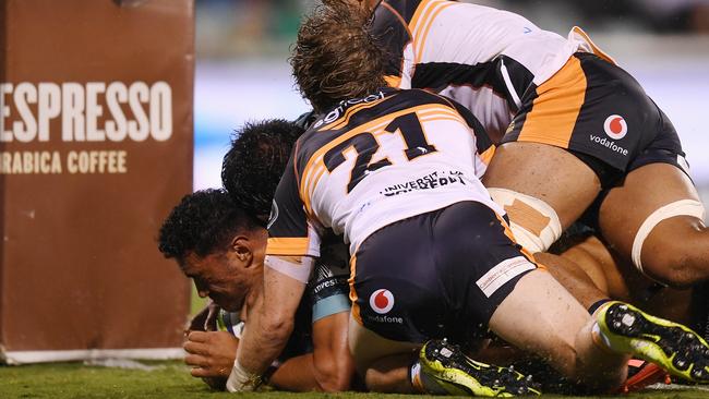 Teariki Ben-Nicholas of the Otago Highlanders scores an overtime try during the round-3 Super Rugby match against the ACT Brumbies in Canberra on Saturday. Picture: Lukas Coch/AAP