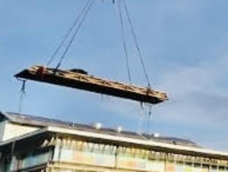 Bullo a 4.5m new arrival to Darwin's Crocosaurus Cove is craned into the tourist attraction at sunrise 28/01/25