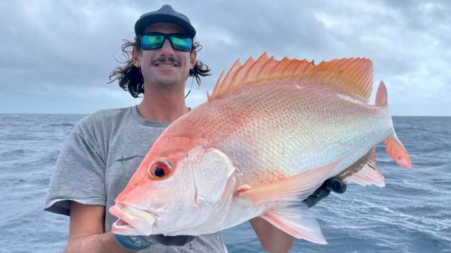 08/09/2022 – Karl Bruanto shows one of several quality large mouth nannygai he caught recently fishing with local charter boat the Sheriff. Picture: Robert Erskine