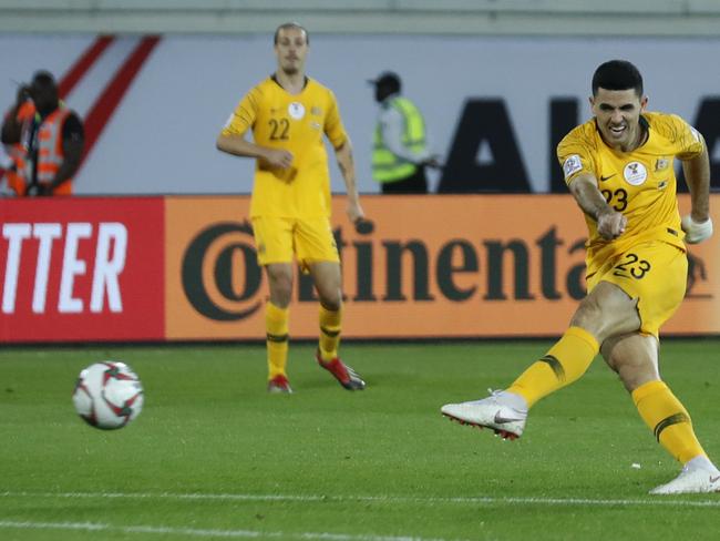 Australia's midfielder Tomas Rogic, right, kicks his goal ball, during the AFC Asian Cup group B soccer match between Australia and Syria at the Khalifa bin Zayed Stadium in Al Ain, United Arab Emirates, Tuesday, Jan. 15, 2019. (AP Photo/Hassan Ammar)