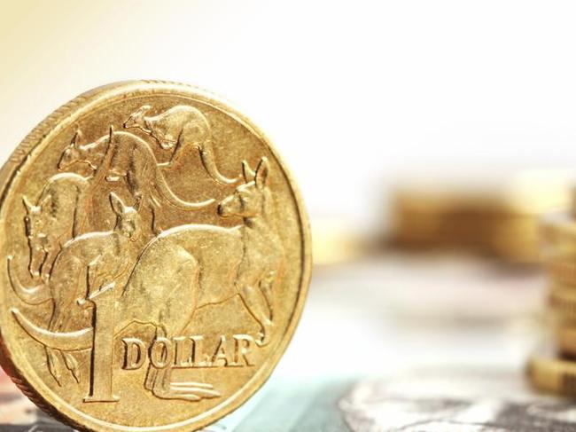 Aussie one dollar coins, on a twenty dollar note.