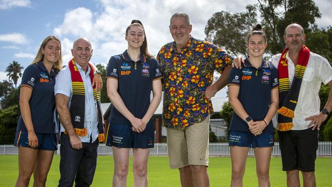 AFLW Crows Women AFL players with their fathers - Madison and Steve Newman, Sarah and Keith Allan and Eloise and Paul Jones on Unley Oval. Picture Emma Brasier