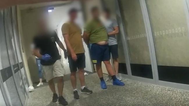 Bodycam footage of police arresting men accused of using the internet to meet a child to sexually abuse. Picture: Queensland Police Service