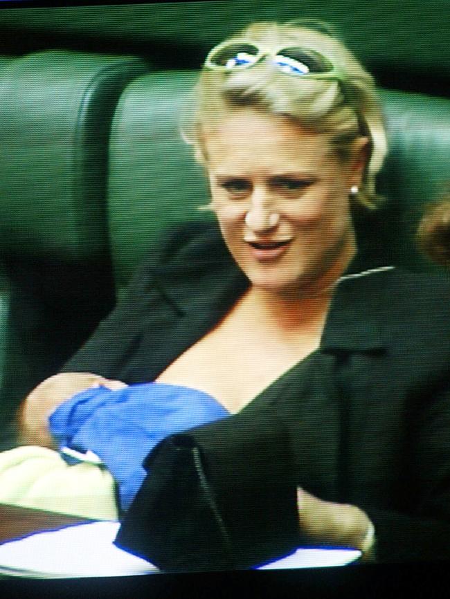 Former skier Kirstie Marshall breastfeeds her baby daughter Charlotte in parliament in 2003 before she was thrown out. Picture: Channel 7