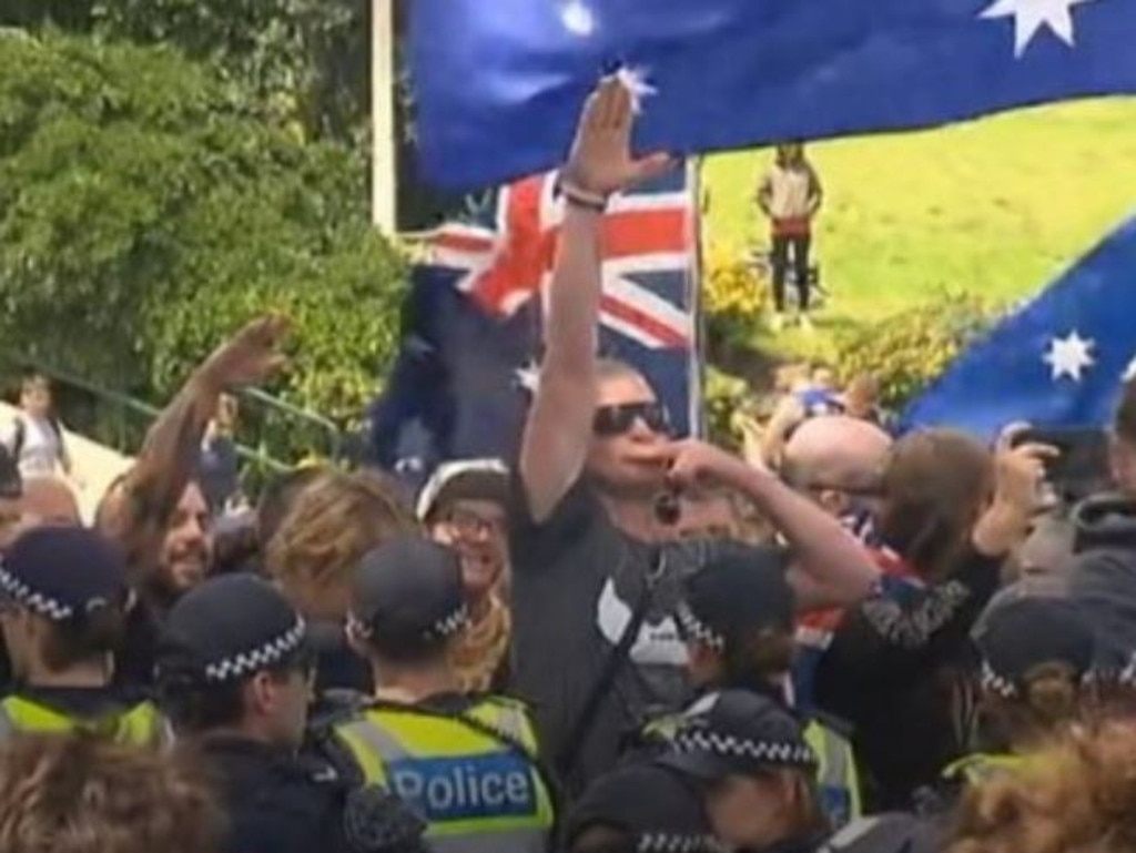 A protester doing the Nazi salute at a far-right rally in St Kilda. Picture: ABC News
