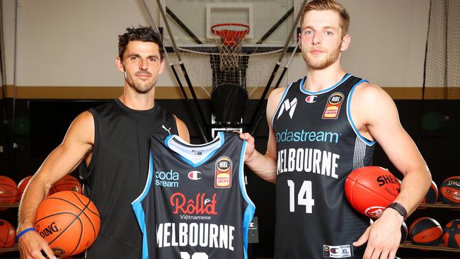 Collingwood’s Scott Pendlebury and Melbourne United’s Jack White. Picture: Mark Stewart