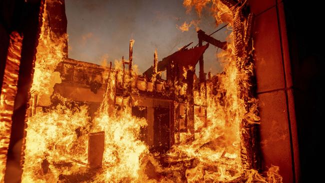 A fire destroys a house in the Pacific Palisades neighbourhood of Los Angeles. Picture: AP