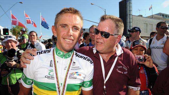 Allan Davis celebrates with his father, Greg, after finishing the 262.7km elite men's road race at the 2010 UCI Road World Championships. Picture: JOE CASTRO/AAP