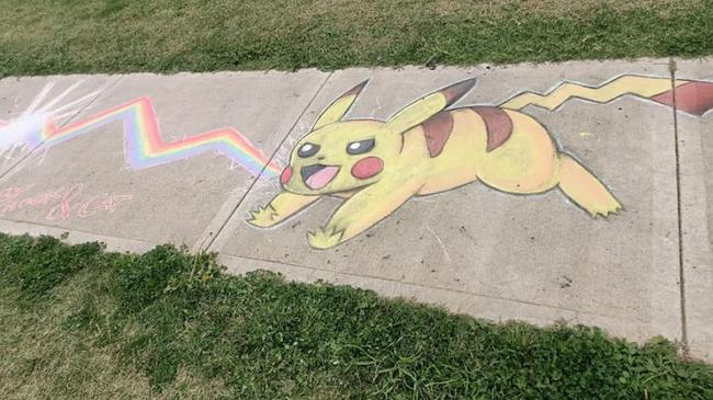 Footpath art featuring the iconic Pokemon monster Pikachu, by Chook and Cat Romanczukiewicz in Bacchus Marsh, Victoria. Picture: Facebook