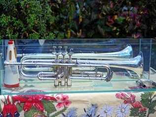 SHARING MEMORIES: Cecil Ryan's children donated his trumpet to the Pioneer Park museum. Picture: Will Ryan