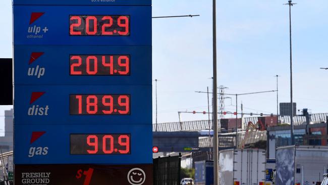 A sign outside a petrol station shows the price of petrol breaking through the $2 a litre mark in Melbourne on March 3. Picture: AFP