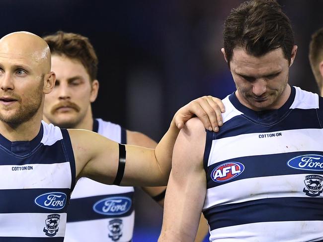 Gary Ablett (left) and Patrick Dangerfield (third from left) of the Cats react after the Round 16 AFL match between the Western Bulldogs and the Geelong Cats at Marvel Stadium in Melbourne, Saturday, July 6, 2019. (AAP Image/Julian Smith) NO ARCHIVING, EDITORIAL USE ONLY