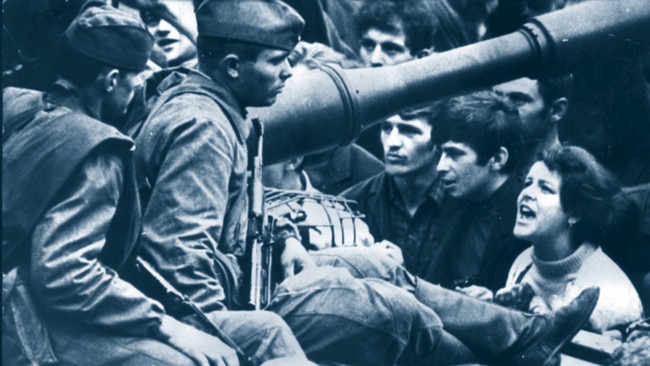 A Czech protester shouting “Go home, Ivan” to a Russian soldier in 1968.