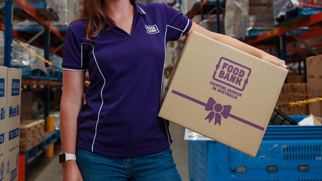 **The Thanks A Million campaign** Helen Bell at the Foodbank warehouse, in Glendenning, today. Helen who had just started working at Foodbank in late 2019 when a number of bushfires hit and she had to quickly respond, working midnight shifts and weekends managing donor enquiries from the Australian and international communities. Picture:Justin Lloyd