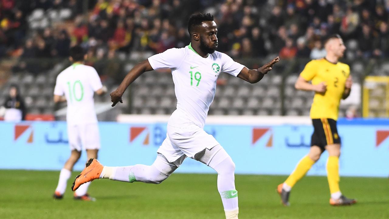 (FILES) In this file photo taken on March 27, 2018, Saudi Arabia's forward Fahad Al-Muwallad controls the ball during a frienldy match between Belgium and Saudi Arabia at the King Baudouin Stadium in Brussels. / AFP PHOTO / Emmanuel DUNAND