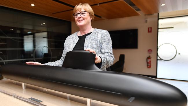 Then defence minister Linda Reynolds poses last year with a model of the French submarine. icture: AAP