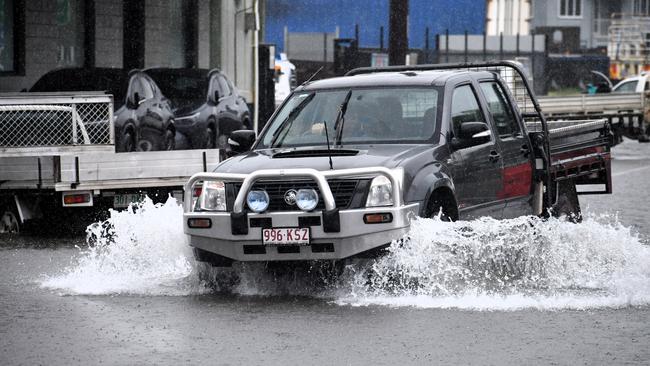 Widespread surface flooding has impacted parts of Ingham on Tuesday, with the flooding Seymour River cutting the Bruce Highway to the north of the Hinchinbrook town. Picture: Cameron Bates