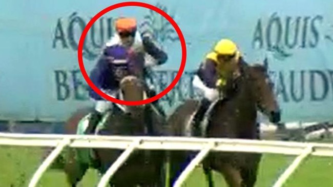 Quade (Jag Guthman-Chester, circled) was elevated from second to first after stewards deemed he was tightened by Beachside Babe (Andrew Spinks, yellow cap) at the 300m. Picture: Screengrab/Racing Queensland