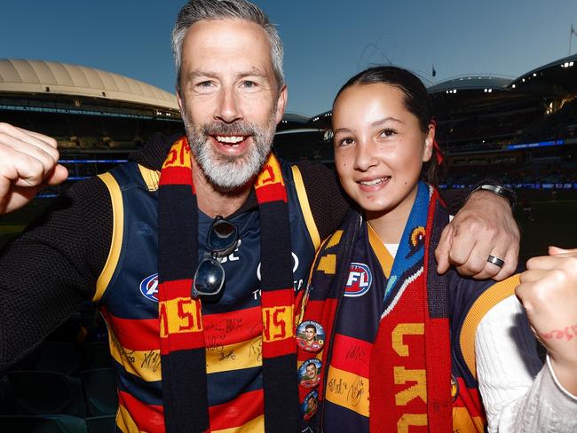 ADELAIDE, AUSTRALIA - APRIL 04: Crows fans pose during the 2024 AFL Round 04 match between the Adelaide Crows and the Melbourne Demons at Adelaide Oval on April 04, 2024 in Adelaide, Australia. (Photo by Michael Willson/AFL Photos via Getty Images)