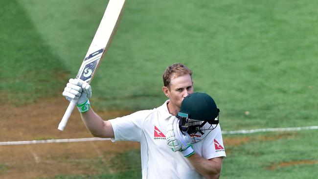 Adam Voges of Australia celebrates 200 runs during day three of the first cricket Test match between New Zealand and Australia at the Basin Reserve in Wellington on February 14, 2016. / AFP / Marty Melville
