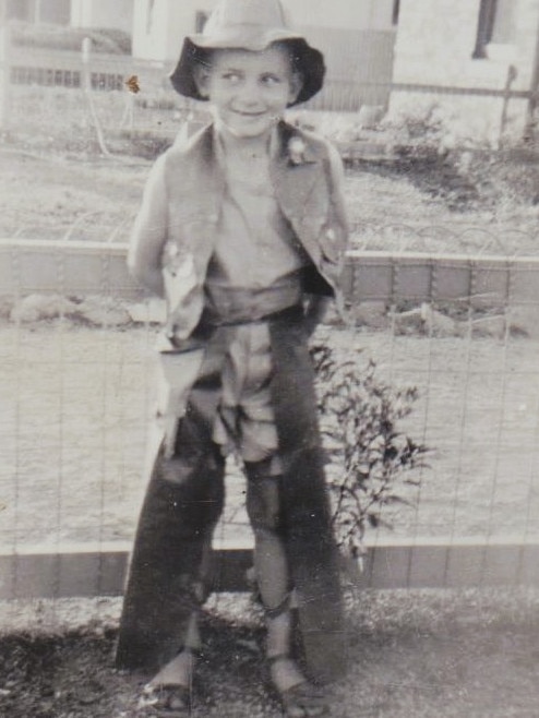 John Cronin at age 7 out the front of his family's South Plympton home. Picture: Supplied
