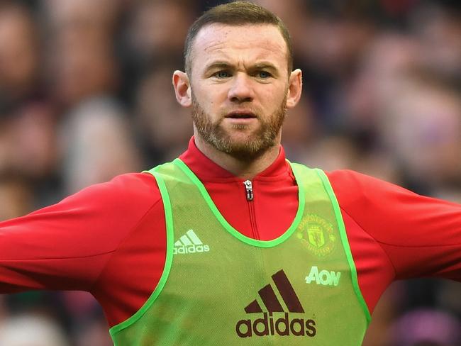 MANCHESTER, ENGLAND - NOVEMBER 19: Wayne Rooney of Manchester United warms up during the Premier League match between Manchester United and Arsenal at Old Trafford on November 19, 2016 in Manchester, England. (Photo by Shaun Botterill/Getty Images)