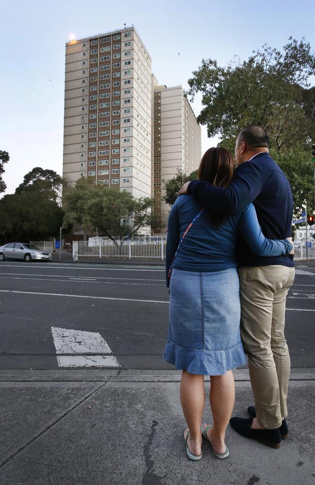 The youngest daughter and son, who asked not to be identified stand outside the Richmond housing commission flats where their mother was murdered. Picture: David Caird