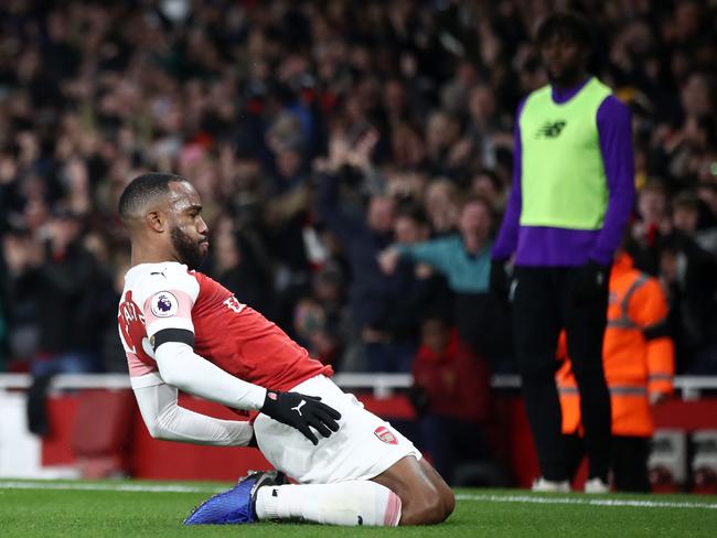 LONDON, ENGLAND - NOVEMBER 03:  Alexandre Lacazette of Arsenal celebrates after he scores his sides first goal during the Premier League match between Arsenal FC and Liverpool FC at Emirates Stadium on November 3, 2018 in London, United Kingdom.  (Photo by Julian Finney/Getty Images)